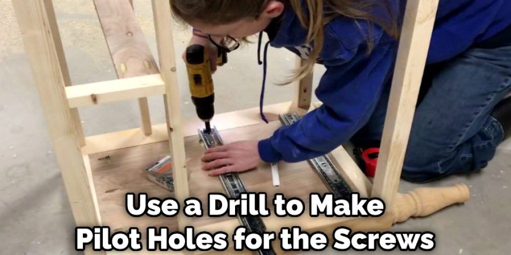 Use a Drill to Make Pilot Holes for the Screws