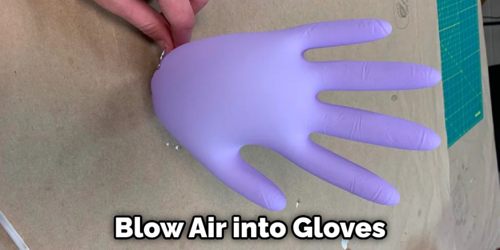 Blow Air into Gloves