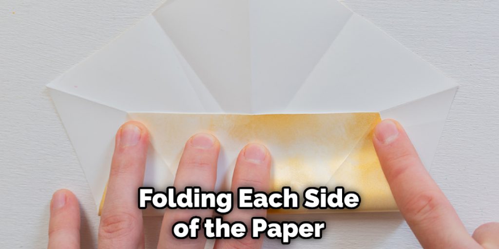 Folding Each Side of the Paper
