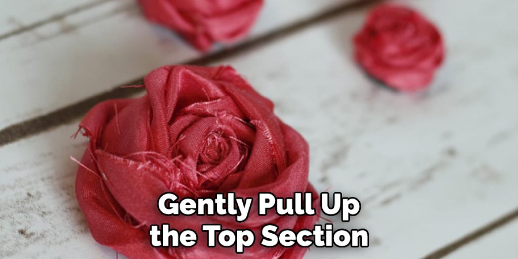 Gently Pull Up the Top Section