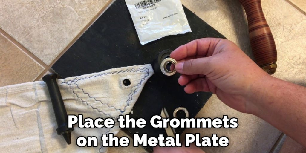 Place the Grommets on the Metal Plate