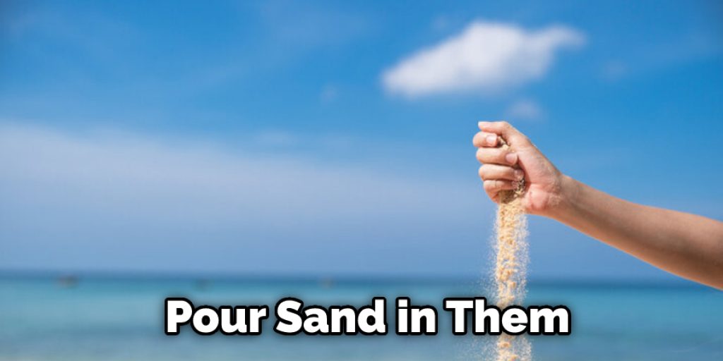 Pour Sand in Them