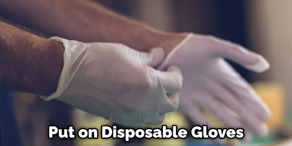 Put on Disposable Gloves