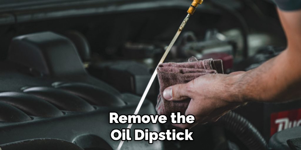 Remove the Oil Dipstick