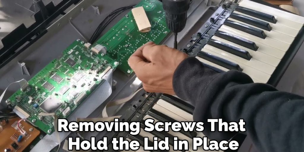 Removing Screws That Hold the Lid in Place