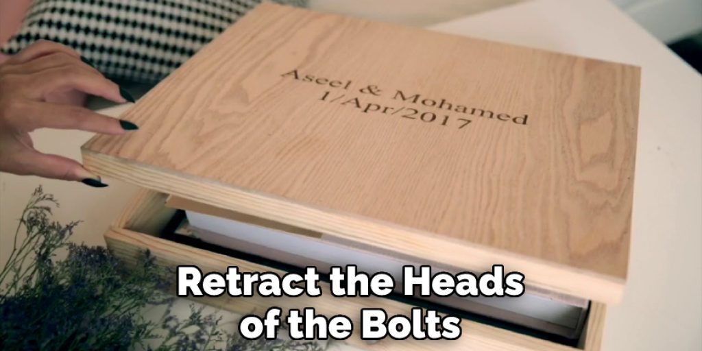 Retract the Heads of the Bolts