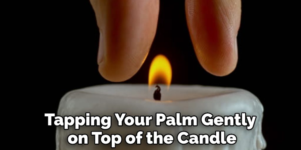 Tapping Your Palm Gently on Top of the Candle