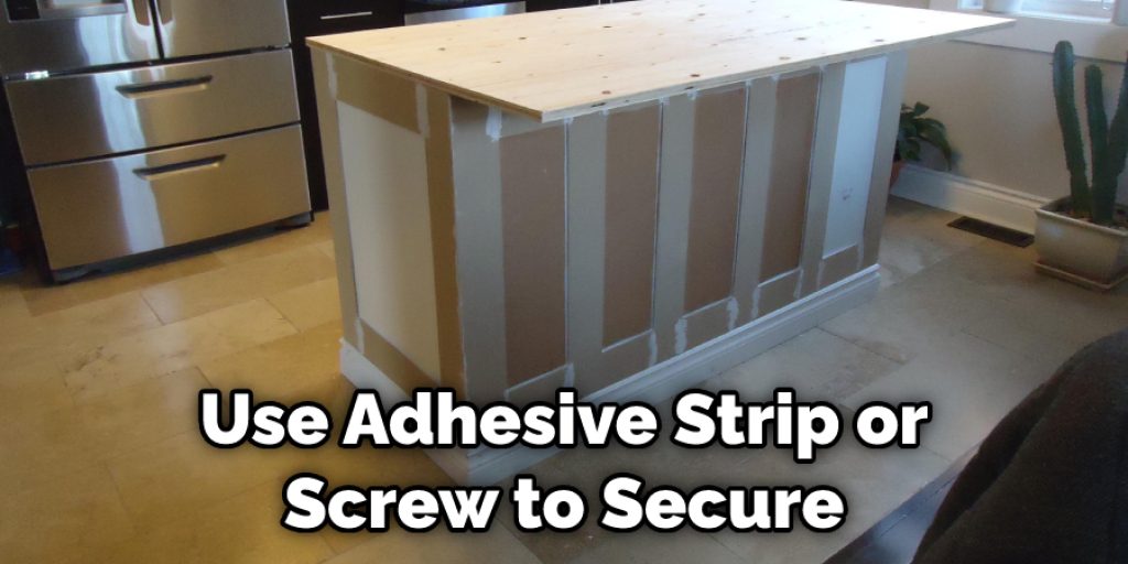 Use Adhesive Strip or Screw to Secure