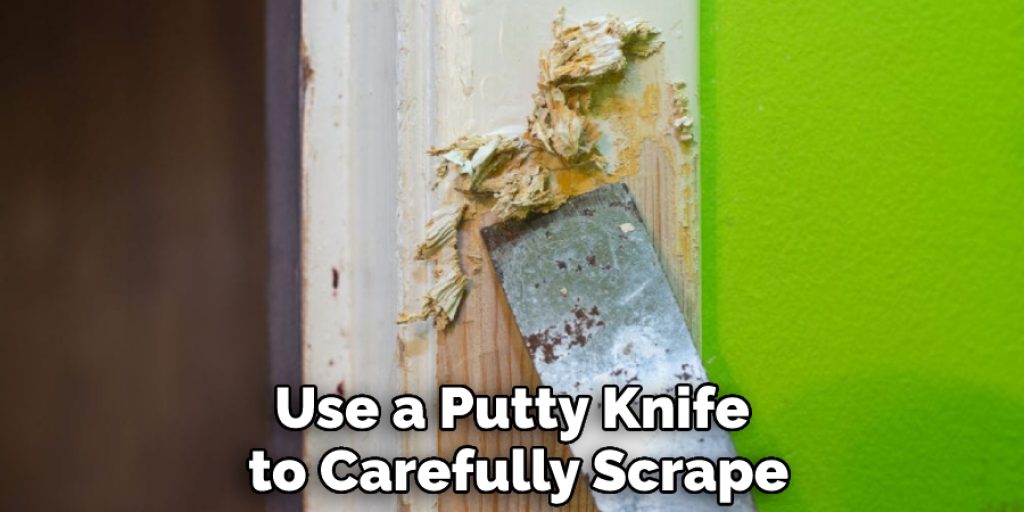 Use a Putty Knife to Carefully Scrape
