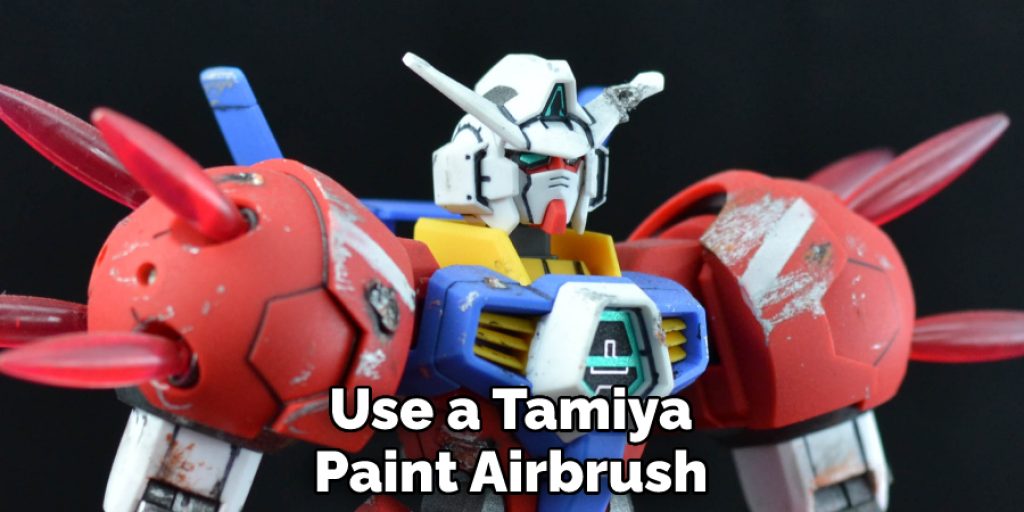 Use a Tamiya Paint Airbrush