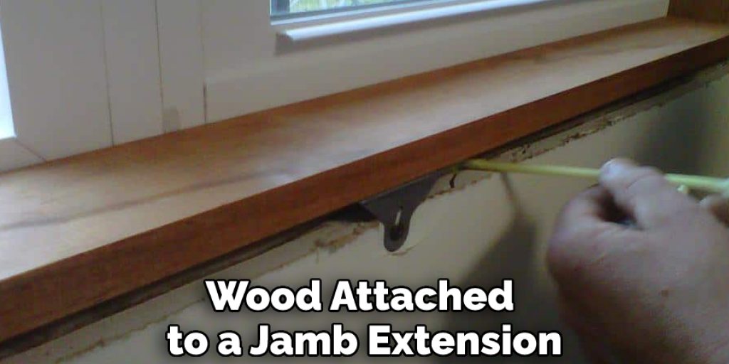 Wood Attached to a Jamb Extension