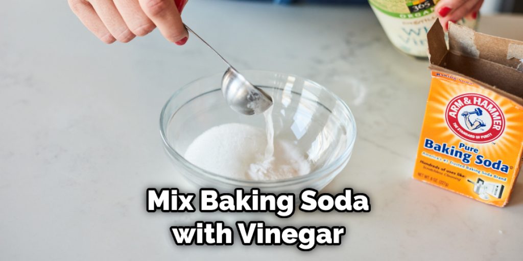 Mix Baking Soda with Vinegar