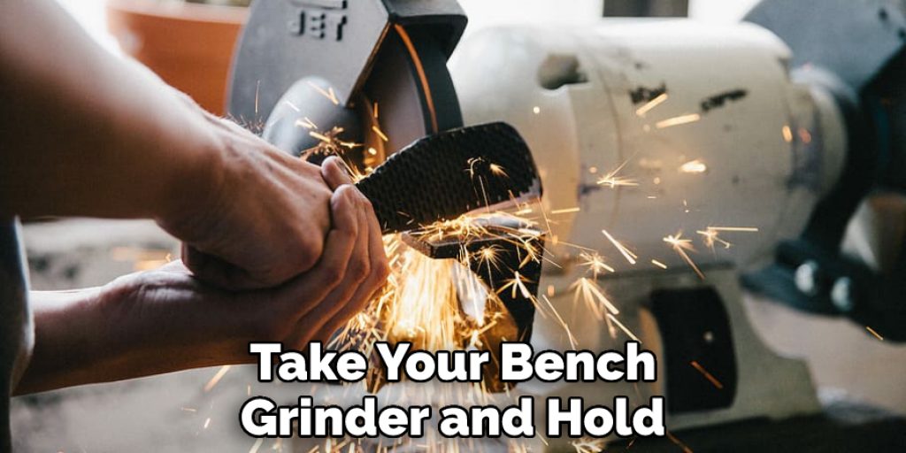 Take Your Bench Grinder and Hold