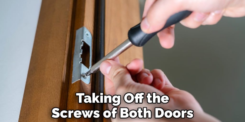 Taking Off the Screws of Both Doors