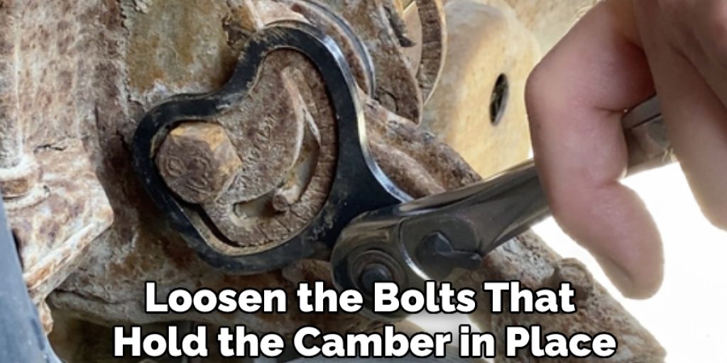 Loosen the Bolts That Hold the Camber in Place