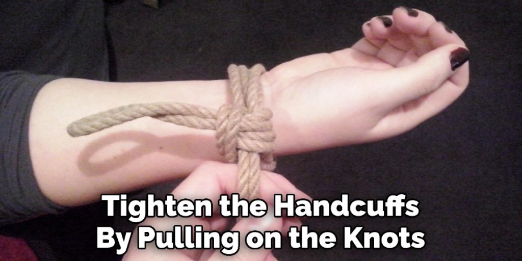 Tighten the Handcuffs By Pulling on the Knots