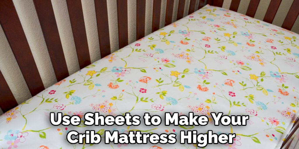 Use Sheets to Make Your Crib Mattress Higher