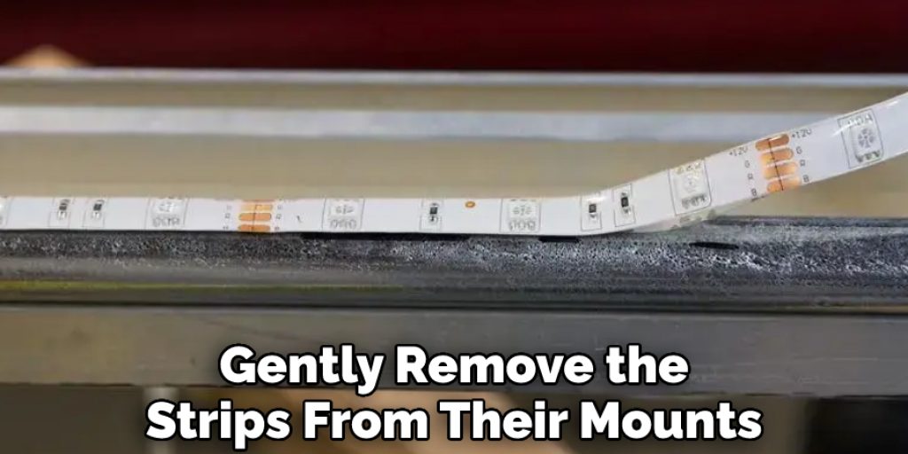 Gently Remove the Strips From Their Mounts