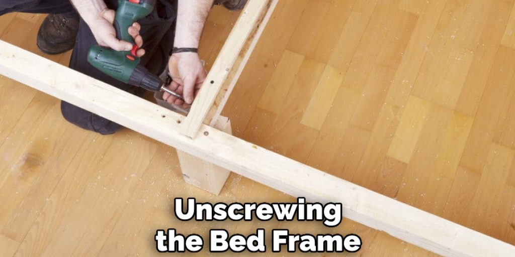 Unscrewing the Bed Frame