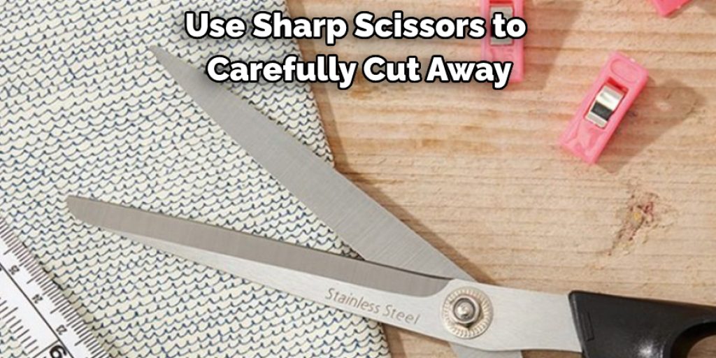 Use Sharp Scissors to Carefully Cut Away