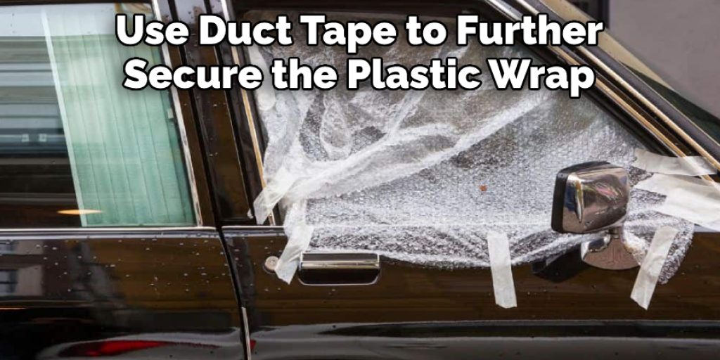 Use Duct Tape to Further Secure the Plastic Wrap