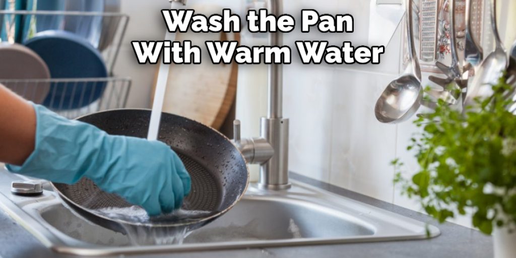 Wash the Pan With Warm Water