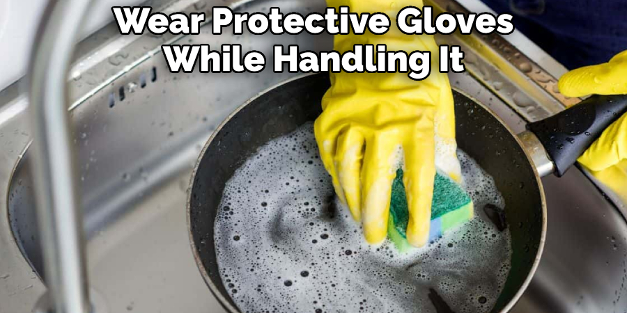 Wear Protective Gloves While Handling It