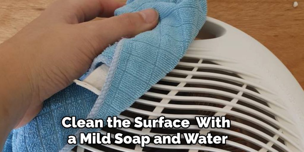 Clean the Surface  With a Mild Soap and Water