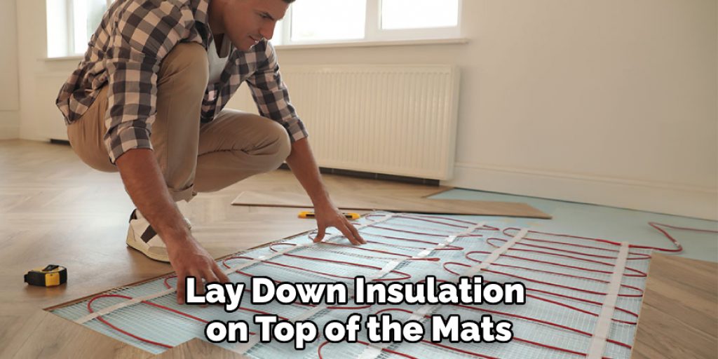 Lay Down Insulation on Top of the Mats