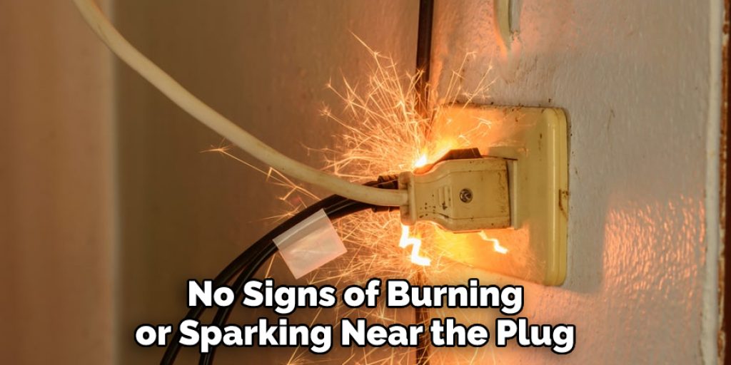 No Signs of Burning or Sparking Near the Plug