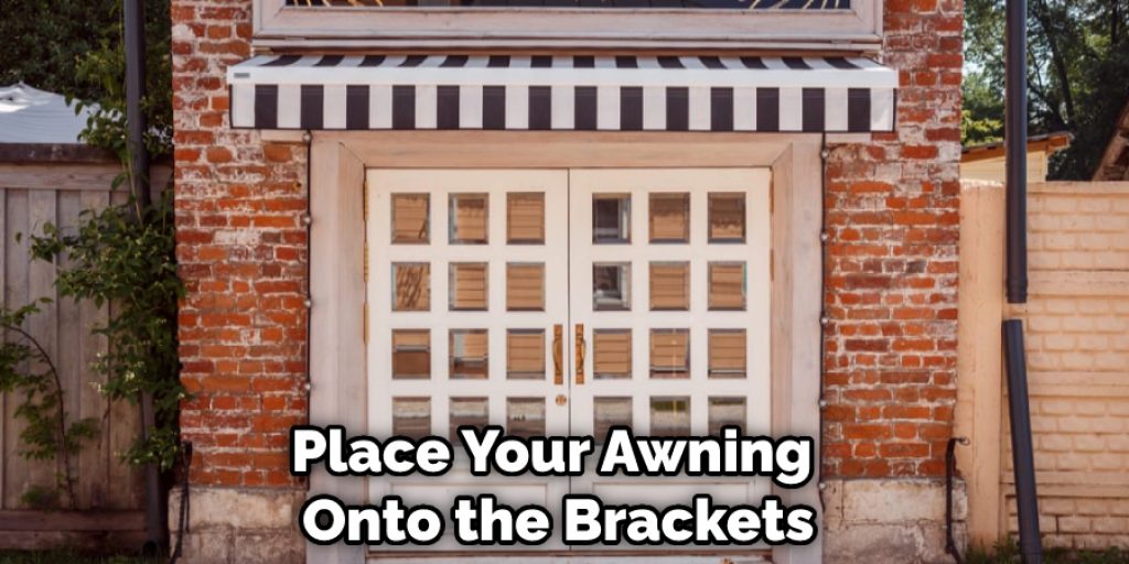 Place Your Awning Onto the Brackets