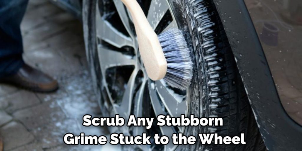 Scrub Any Stubborn Grime Stuck to the Wheel