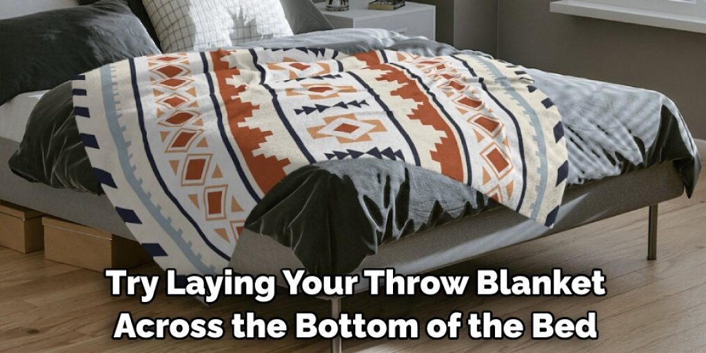  Try Laying Your Throw Blanket Across the Bottom of the Bed