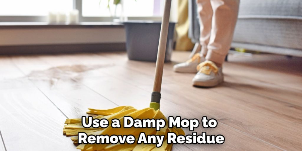 Use a Damp Mop to Remove Any Residue