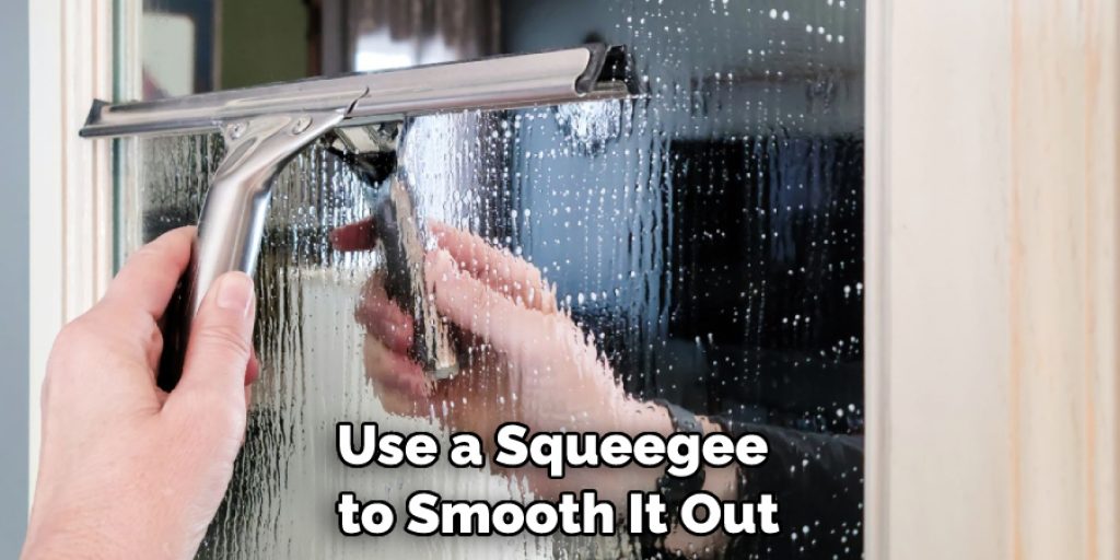 Use a Squeegee to Smooth It Out