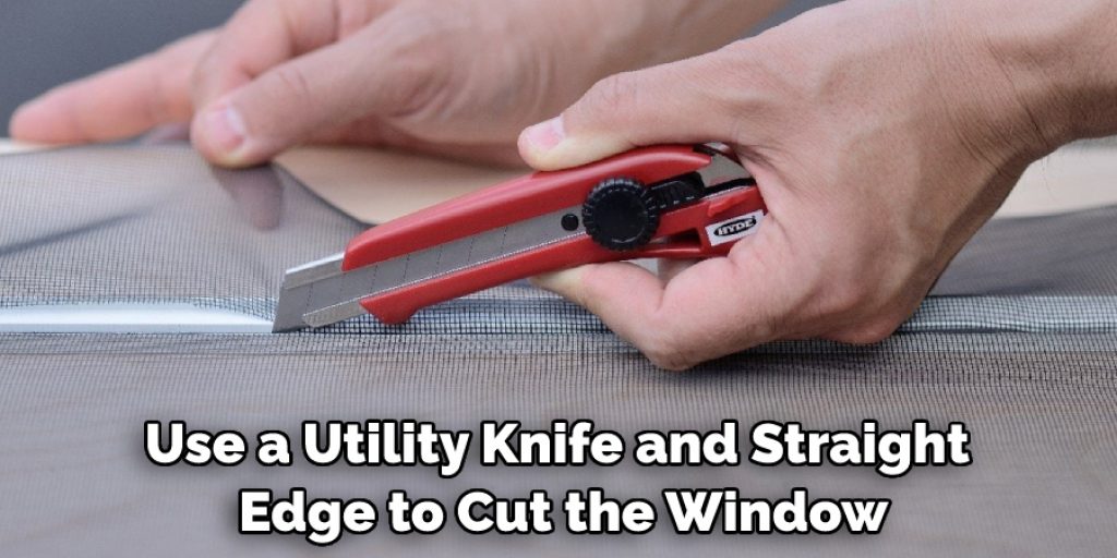 Use a Utility Knife and Straight Edge to Cut the Window