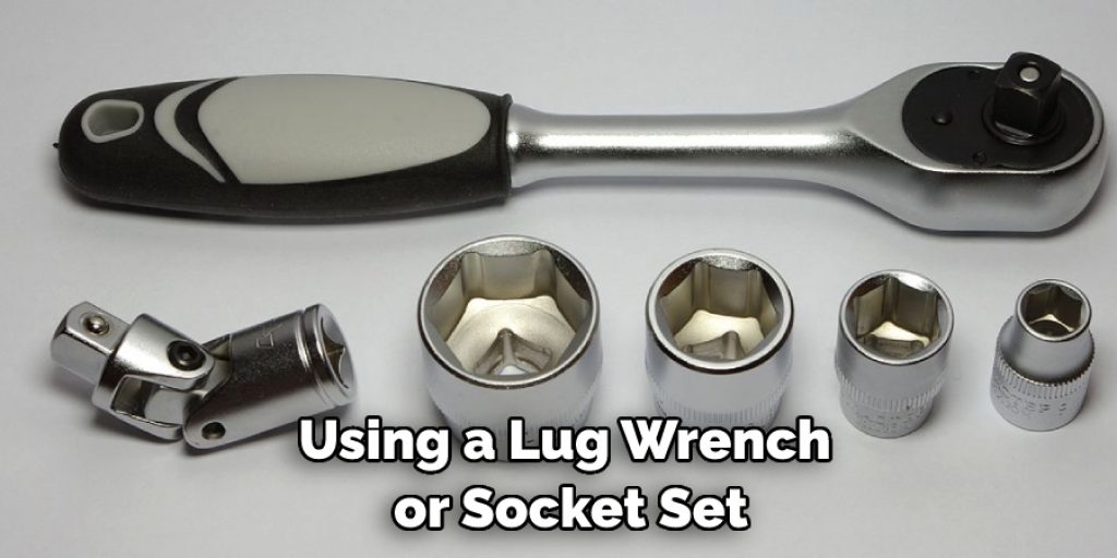 Using a Lug Wrench or Socket Set