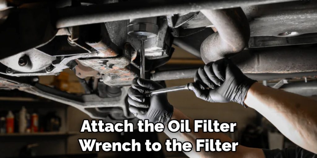 Attach the Oil Filter Wrench to the Filter