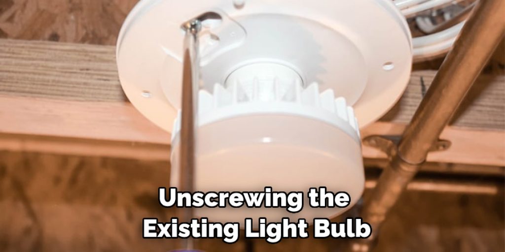 Unscrewing the Existing Light Bulb