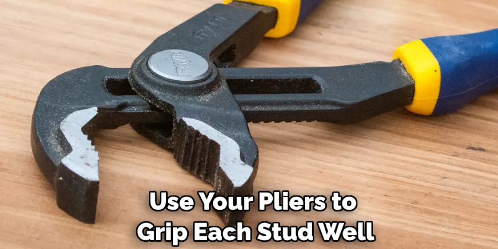 Use Your Pliers to Grip Each Stud Well