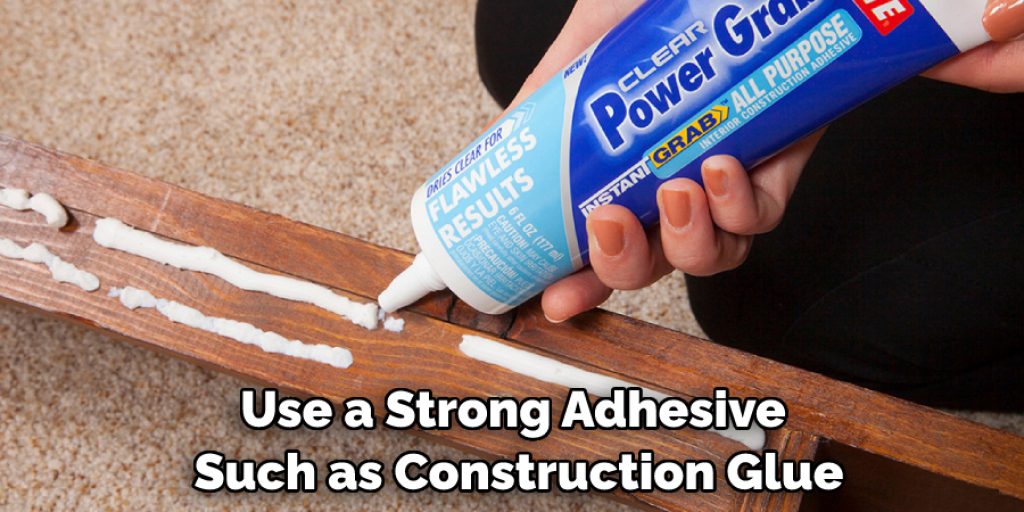 Use a Strong Adhesive Such as Construction Glue