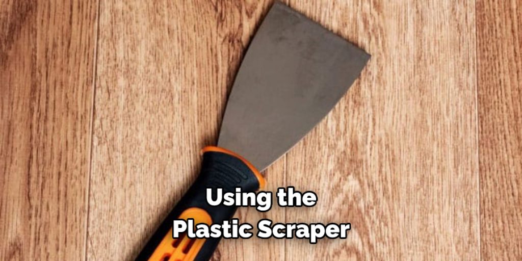 Using the 
Plastic Scraper