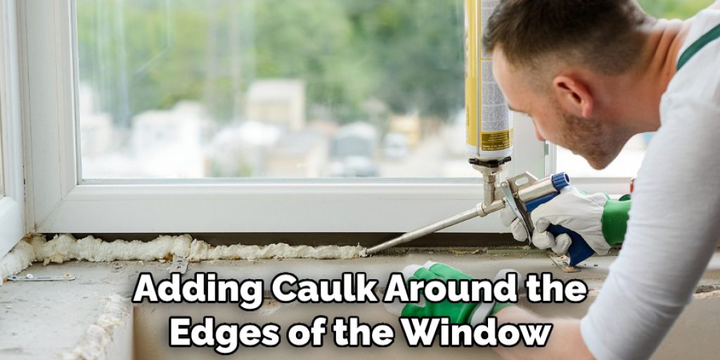 Adding Caulk Around the Edges of the Window