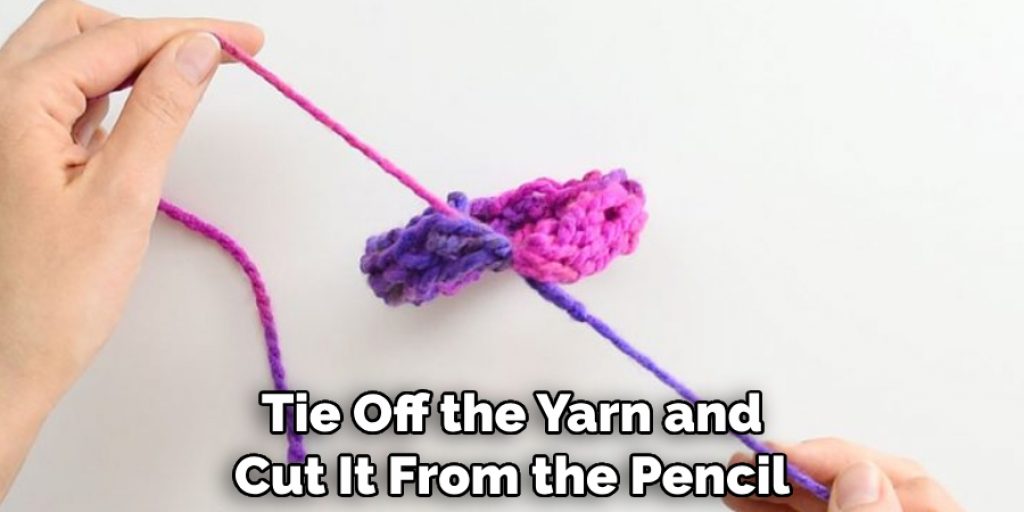 Tie Off the Yarn and Cut It From the Pencil