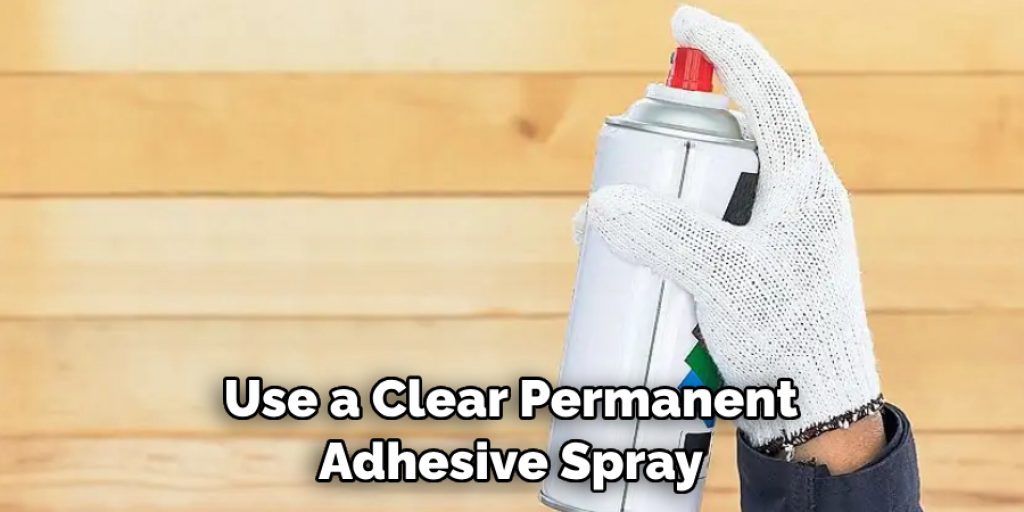 Use a Clear Permanent Adhesive Spray