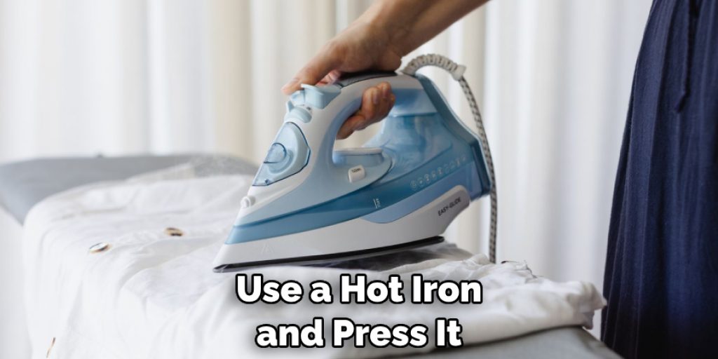Use a Hot Iron and Press It