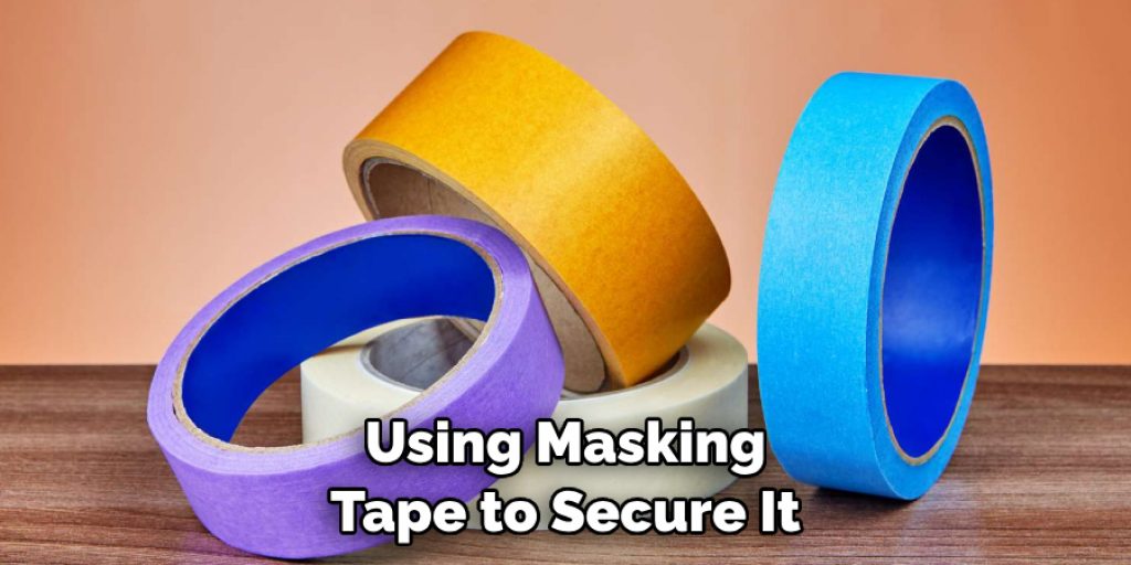 Using Masking Tape to Secure It