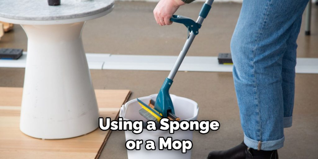 Using a Sponge or a Mop