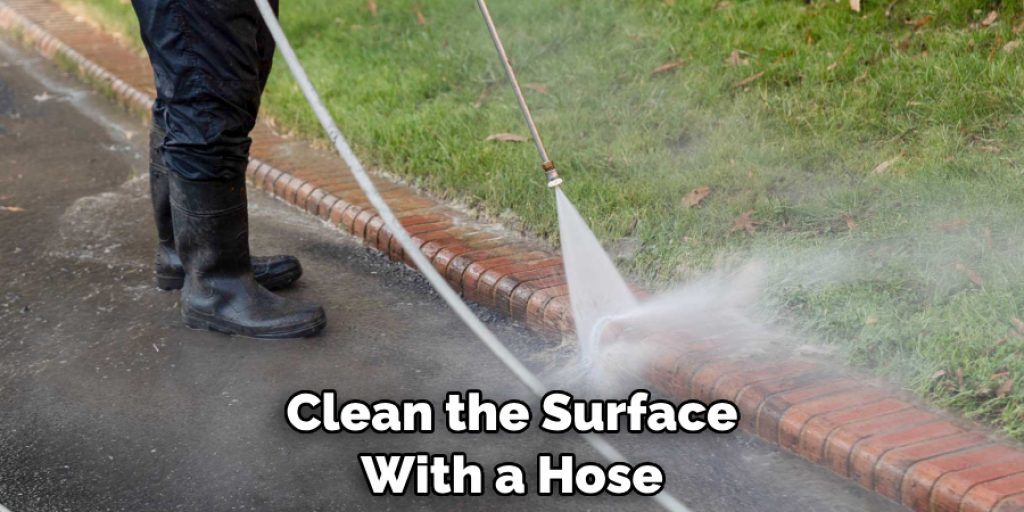 Clean the Surface With a Hose