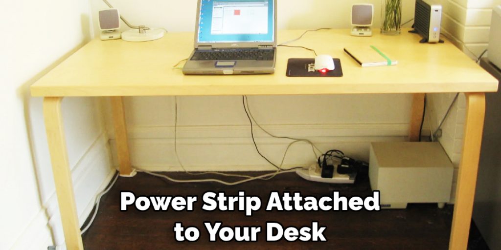 Power Strip Attached to Your Desk